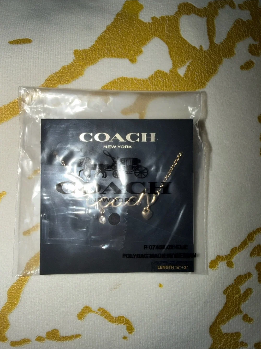 Coach necklace gold